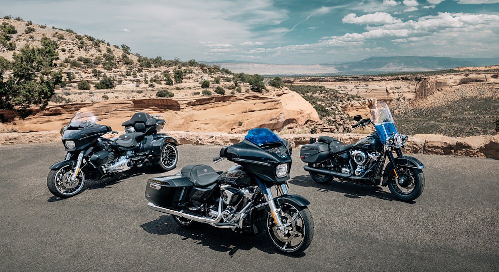 three special Liberty Edition models parked in a desert mountain scene